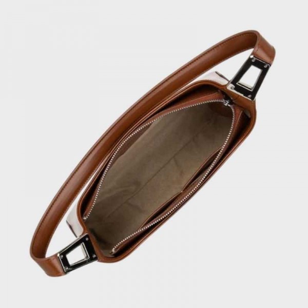 Lancaster - Sac baguette en cuir... Lancaster - Sac baguette en cuir...