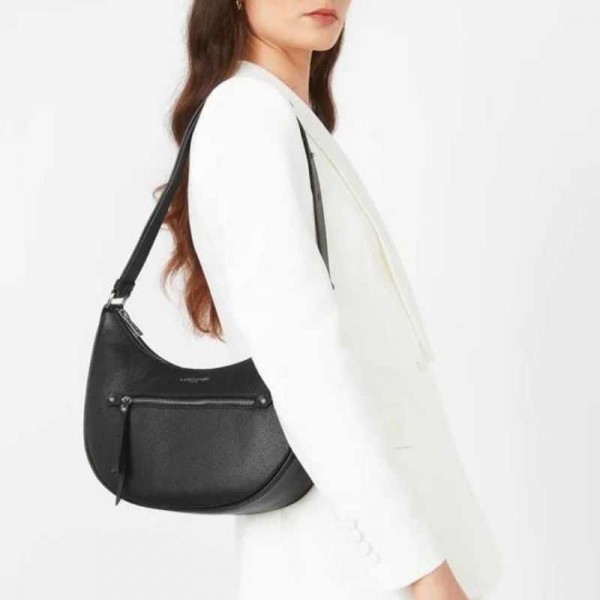 Lancaster - Sac besace en cuir... Lancaster - Sac besace en cuir...