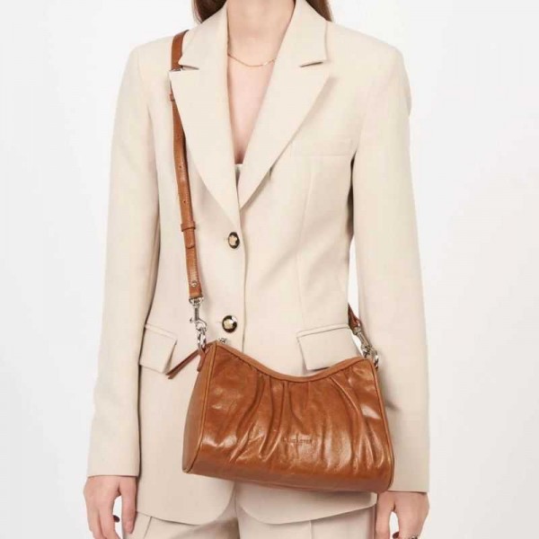 Lancaster - Sac baguette en cuir...