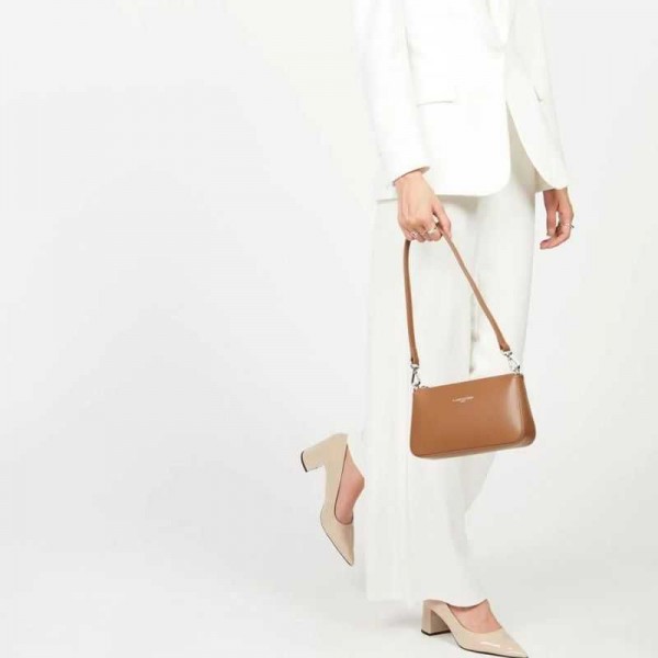 Lancaster - Sac trotteur en cuir... Lancaster - Sac trotteur en cuir...