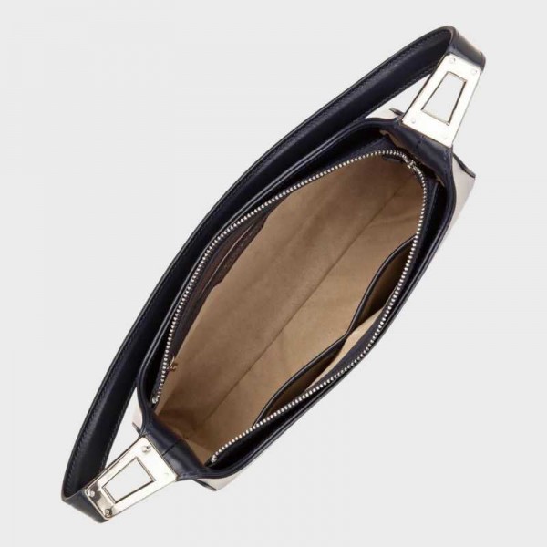 Lancaster - Sac baguette en cuir... Lancaster - Sac baguette en cuir...