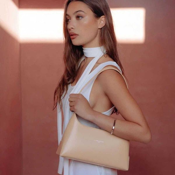 Lancaster - Sac baguette en cuir... Lancaster - Sac baguette en cuir...
