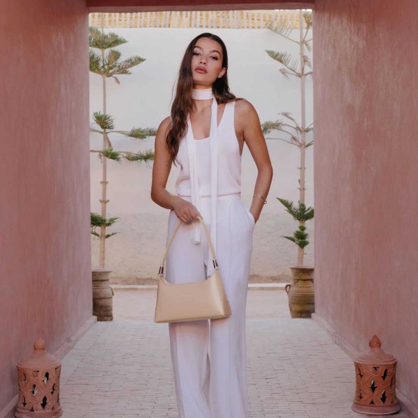 Lancaster - Sac baguette en cuir... Lancaster - Sac baguette en cuir...