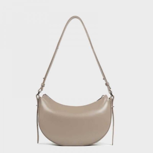 Lancaster- Sac demi-lune en cuir...